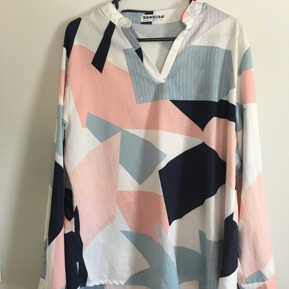 Satin/Silky textured blouse.